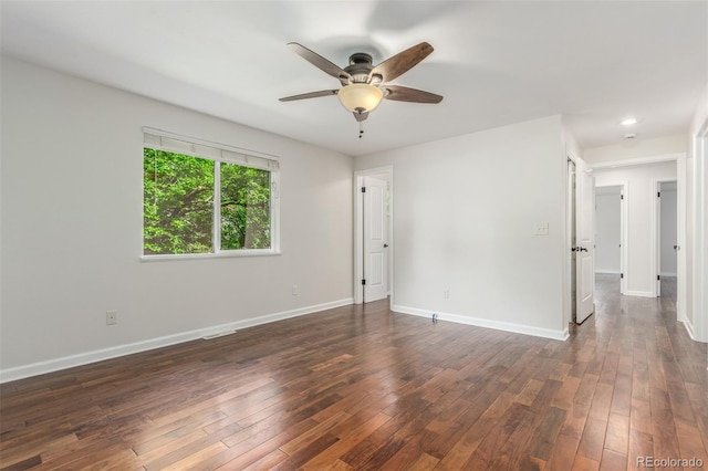 5890 W Quarles Dr, Littleton, CO 80128 - empty room with ceiling fan, baseboards, dark wood finished floors, and recessed lighting