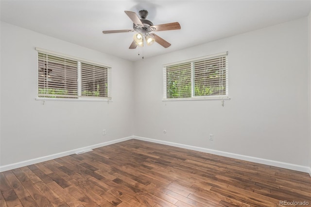 5890 W Quarles Dr, Littleton, CO 80128 - empty room featuring baseboards, wood finished floors, and ceiling fan