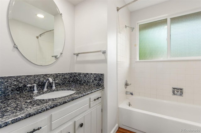 5890 W Quarles Dr, Littleton, CO 80128 - bathroom with vanity and shower / washtub combination