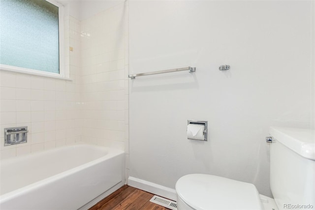 5890 W Quarles Dr, Littleton, CO 80128 - bathroom featuring toilet, wood finished floors, and baseboards