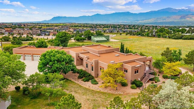 4050 Old Ranch Rd, Colorado Springs, CO 80908 - aerial view of residential area with a mountain backdrop