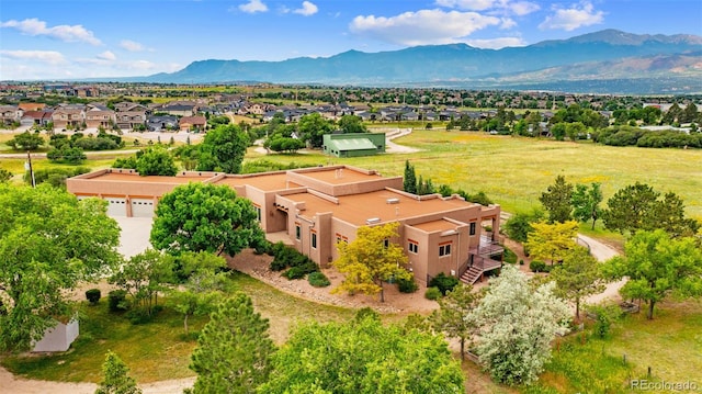 4050 Old Ranch Rd, Colorado Springs, CO 80908 - aerial view of residential area with a mountain backdrop