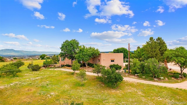 4050 Old Ranch Rd, Colorado Springs, CO 80908 - view of yard with a mountain view and driveway
