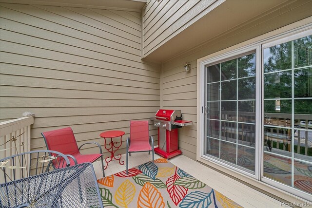 10389 W Fair Ave Unit E, Littleton, CO 80127 - wooden terrace with grilling area