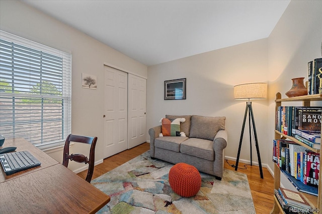 10389 W Fair Ave Unit E, Littleton, CO 80127 - office area featuring wood finished floors and baseboards