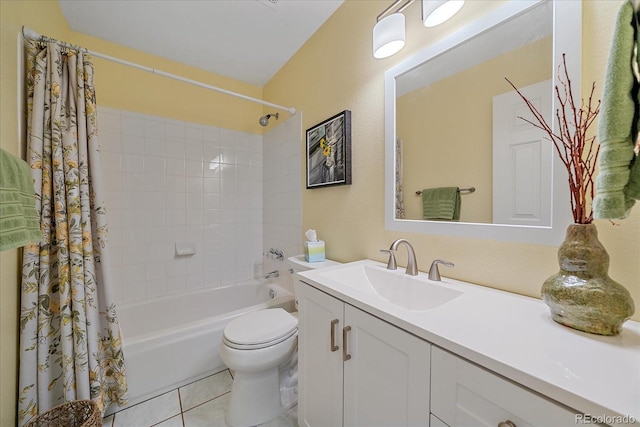 10389 W Fair Ave Unit E, Littleton, CO 80127 - bathroom with shower / tub combo with curtain, vanity, toilet, and tile patterned flooring