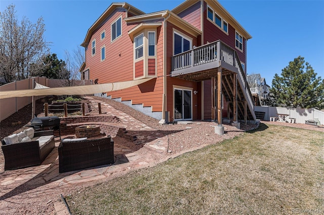 rear view of property featuring stairs, a deck, a fenced backyard, and a patio