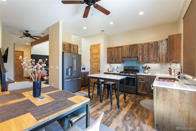 467 E Arkansas St, Buena Vista, CO 81211 - kitchen featuring appliances with stainless steel finishes, a sink, ceiling fan, dark wood-type flooring, and recessed lighting