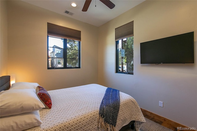 467 E Arkansas St, Buena Vista, CO 81211 - bedroom with wood finished floors, a ceiling fan, and baseboards