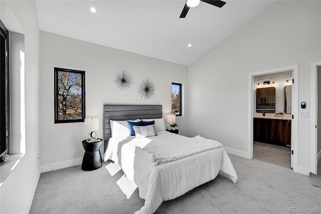 bedroom with baseboards, connected bathroom, light colored carpet, ceiling fan, and recessed lighting