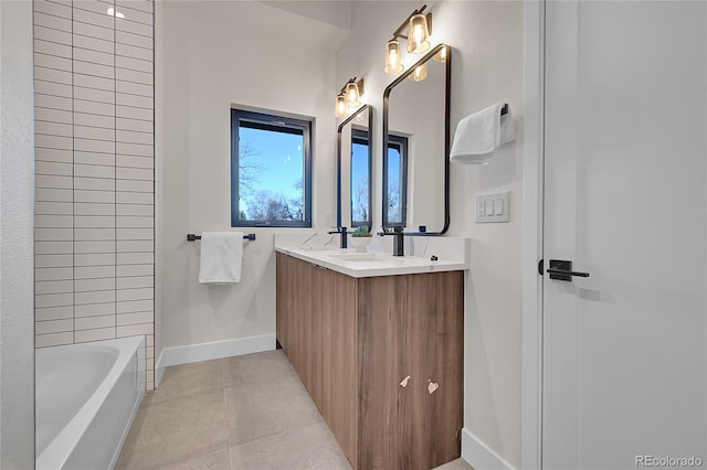 bathroom featuring double vanity, a shower, a bathing tub, and baseboards