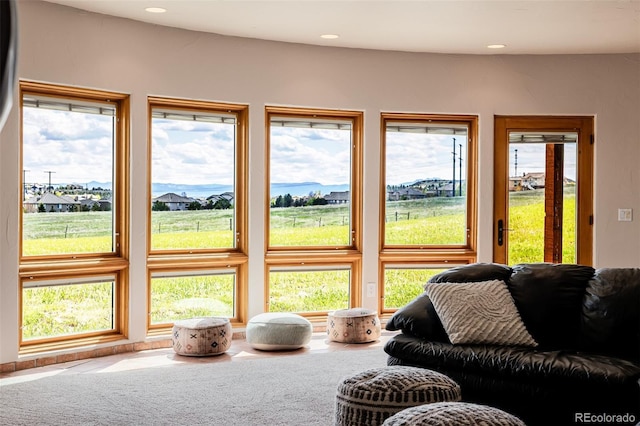 living area with recessed lighting