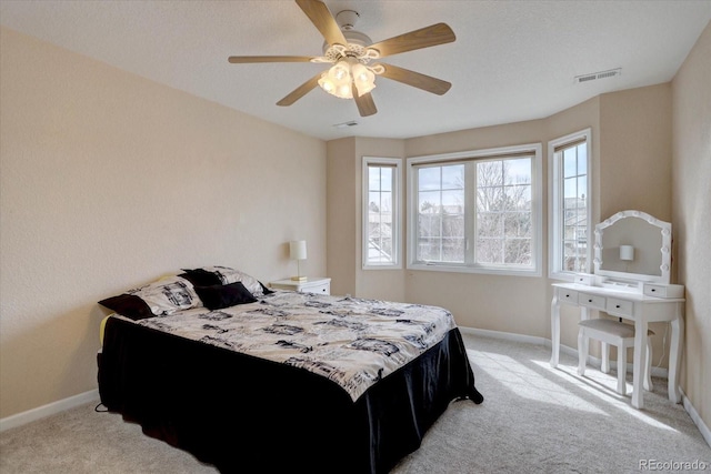 15857 E Aberdeen Ave, Centennial, CO 80016 - bedroom featuring light colored carpet, baseboards, and ceiling fan