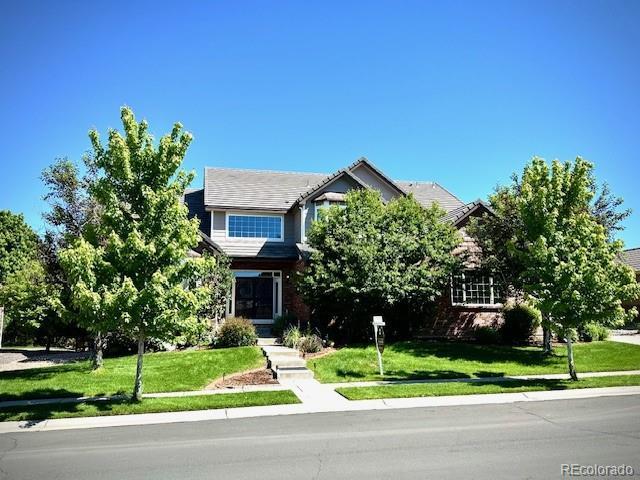 15857 E Aberdeen Ave, Centennial, CO 80016 - obstructed view of property with a front lawn