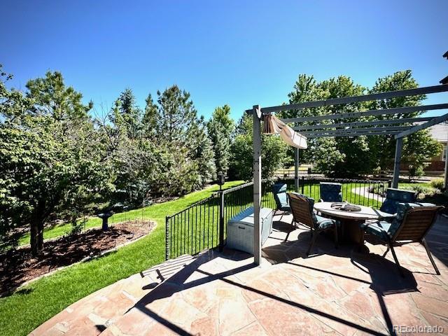 15857 E Aberdeen Ave, Centennial, CO 80016 - view of patio with an outdoor fire pit and a pergola