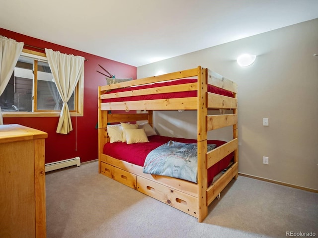 10000 Ryan Gulch Rd Unit 114, Silverthorne, CO 80498 - carpeted bedroom with a baseboard heating unit and baseboards