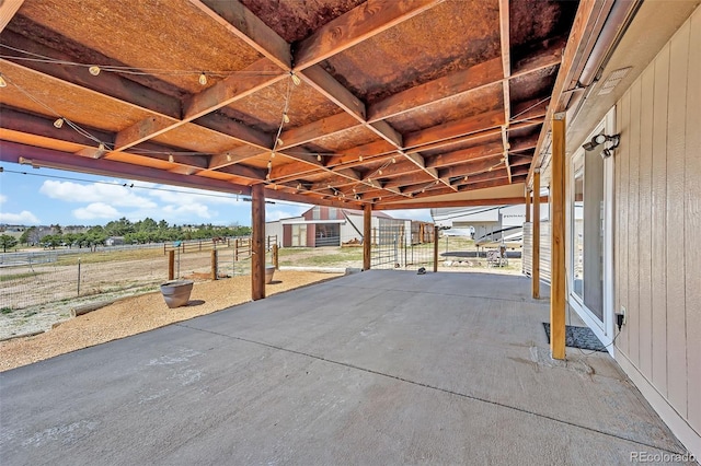 5856 John Ross Ct, Peyton, CO 80831 - view of patio featuring an outbuilding