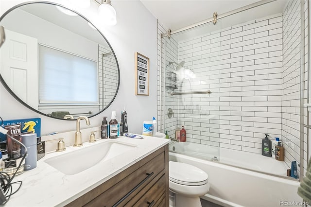 bathroom with toilet, vanity, and bathing tub / shower combination