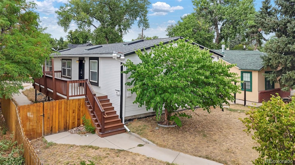 view of front of house featuring a deck