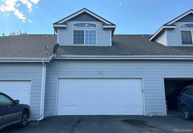 garage featuring driveway
