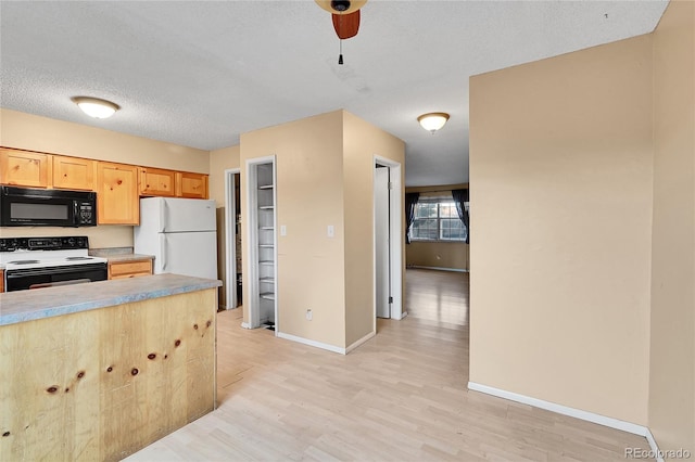 kitchen with ceiling fan, light hardwood / wood-style flooring, a textured ceiling, white appliances, and light brown cabinetry