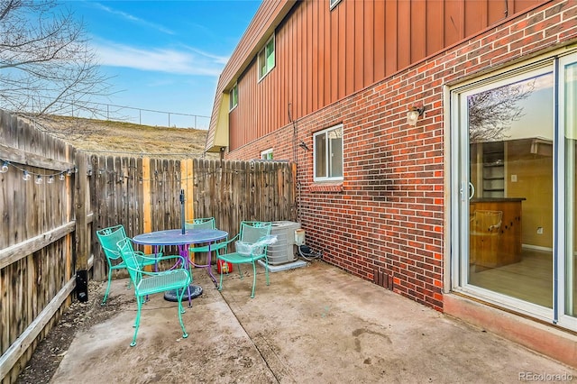 view of patio with cooling unit