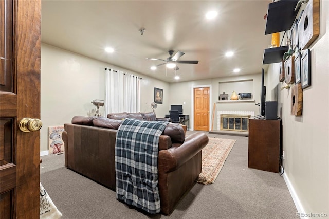 7400 W Quincy Ave, Littleton, CO 80123 - living area with carpet floors, ceiling fan, recessed lighting, and a brick fireplace
