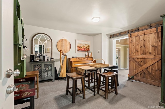 7400 W Quincy Ave, Littleton, CO 80123 - carpeted dining area with a barn door