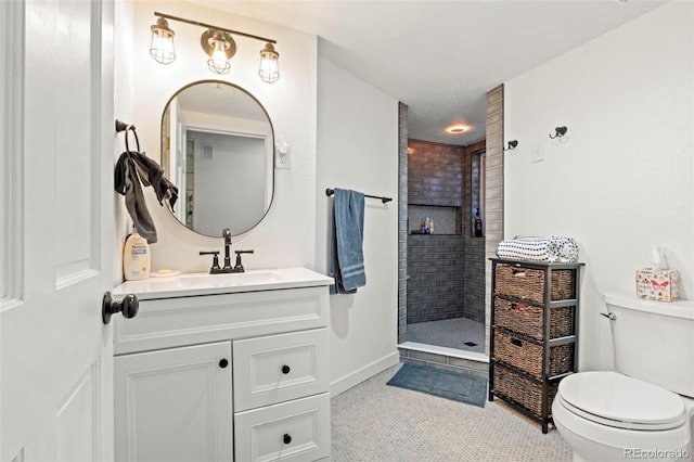7400 W Quincy Ave, Littleton, CO 80123 - bathroom with a tile shower, vanity, and tile patterned flooring