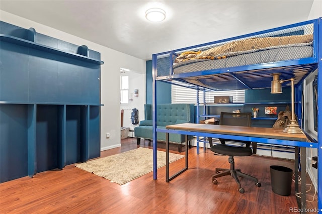 7400 W Quincy Ave, Littleton, CO 80123 - bedroom with wood finished floors and an office area