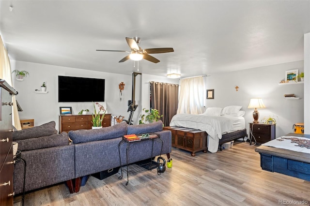 7400 W Quincy Ave, Littleton, CO 80123 - bedroom featuring wood finished floors and ceiling fan