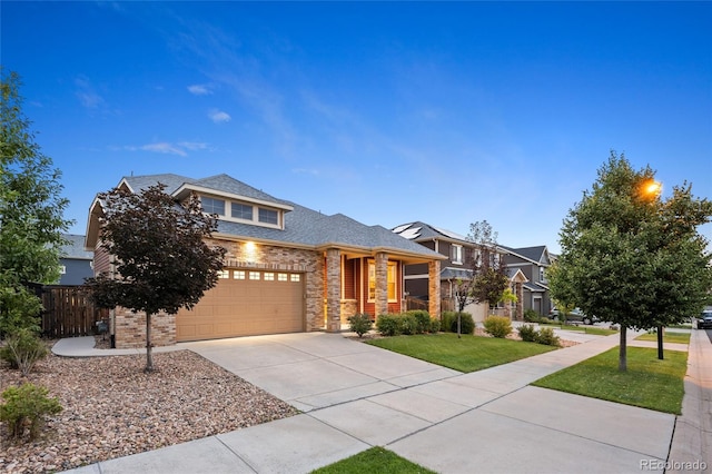 4875 S Catawba St, Aurora, CO 80016 - view of front of house with brick siding and driveway