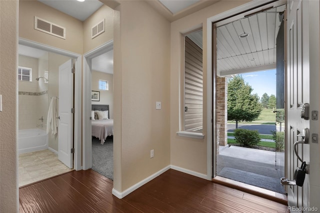 4875 S Catawba St, Aurora, CO 80016 - foyer with dark wood-style floors and baseboards