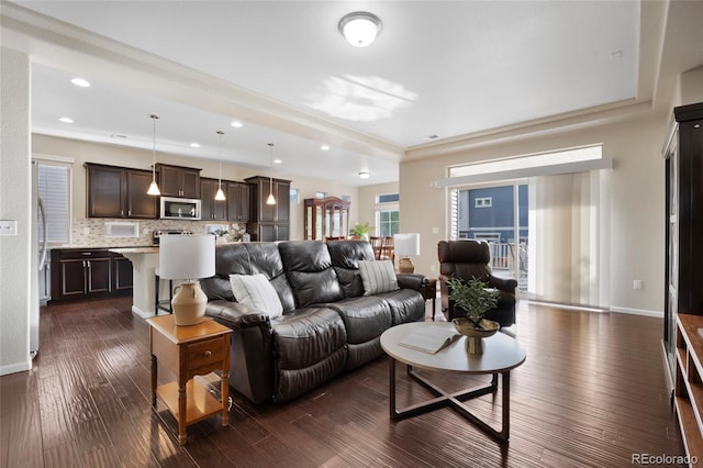 4875 S Catawba St, Aurora, CO 80016 - living area with dark wood finished floors and recessed lighting
