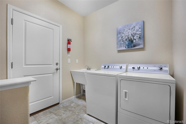 4875 S Catawba St, Aurora, CO 80016 - laundry room with independent washer and dryer and baseboards