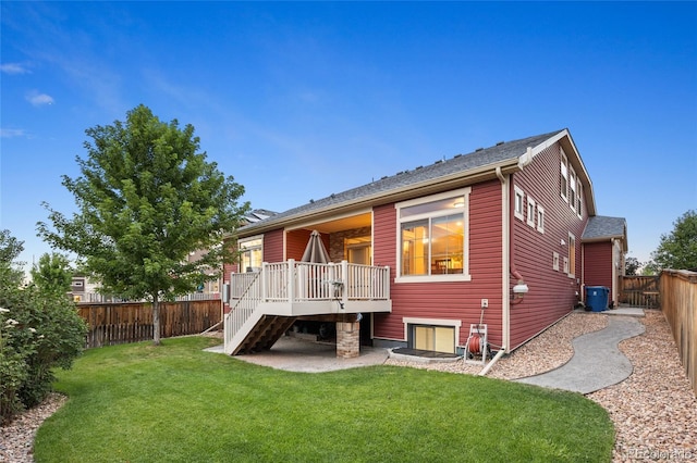 4875 S Catawba St, Aurora, CO 80016 - rear view of property with a fenced backyard, a wooden deck, and stairway