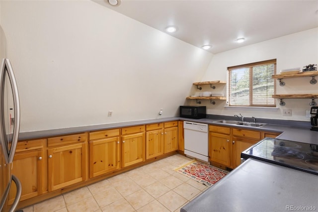 413 W Lake Dr, Divide, CO 80814 - kitchen with black appliances, open shelves, light tile patterned flooring, lofted ceiling, and dark countertops