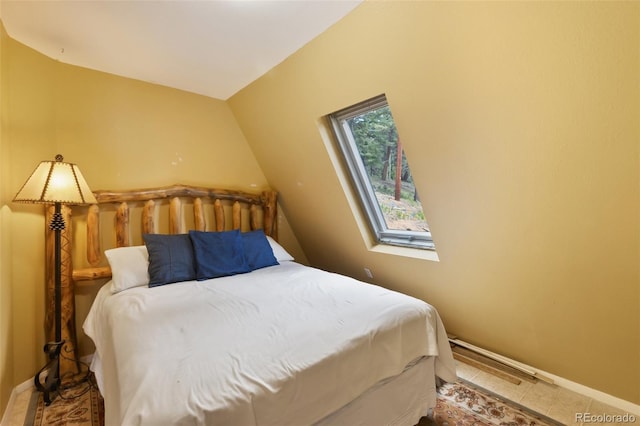 413 W Lake Dr, Divide, CO 80814 - tiled bedroom featuring baseboards