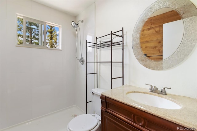 413 W Lake Dr, Divide, CO 80814 - bathroom featuring tiled shower and vanity