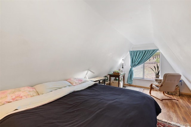413 W Lake Dr, Divide, CO 80814 - bedroom featuring lofted ceiling and wood finished floors