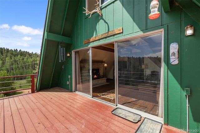 413 W Lake Dr, Divide, CO 80814 - wooden deck featuring a forest view