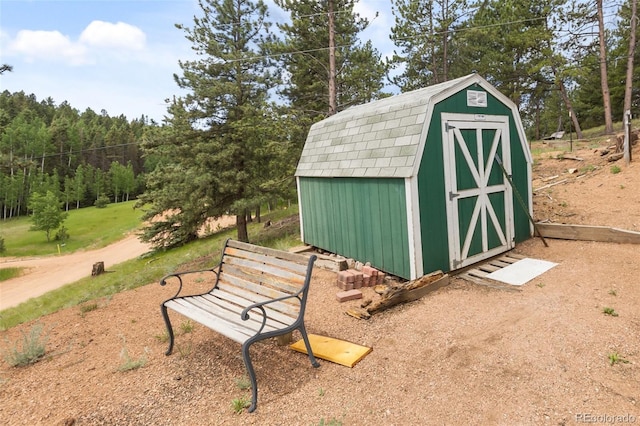 413 W Lake Dr, Divide, CO 80814 - view of shed featuring a forest view