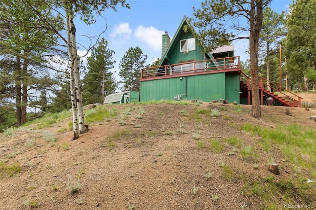 413 W Lake Dr, Divide, CO 80814 - view of yard featuring stairs and a deck