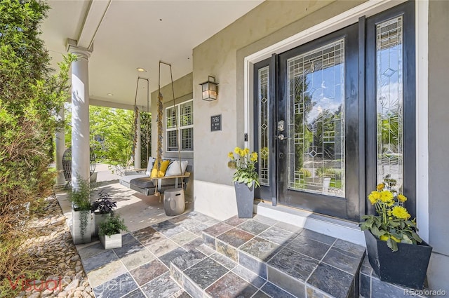 property entrance with a porch