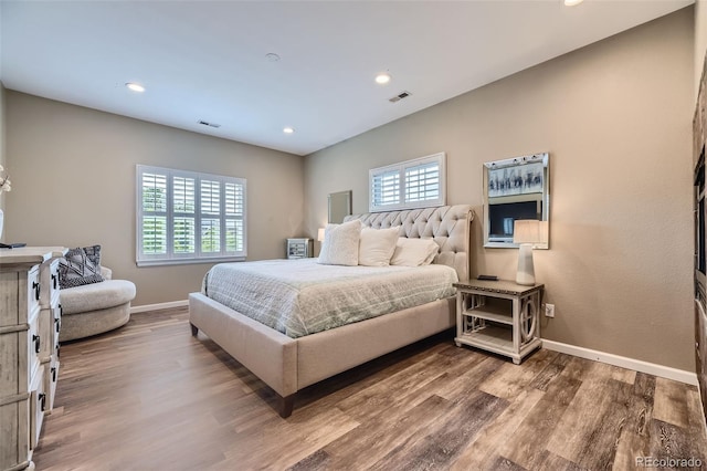 bedroom featuring hardwood / wood-style floors