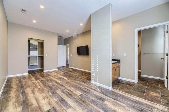 interior space with dark hardwood / wood-style flooring