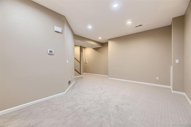 basement with light carpet