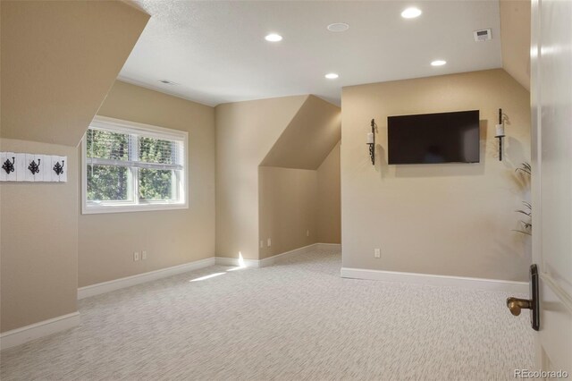 1975 Fox Mountain Pt, Colorado Springs, CO 80906 - additional living space featuring recessed lighting, carpet, baseboards, and visible vents