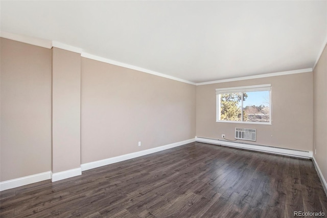 empty room featuring dark wood-type flooring, baseboards, baseboard heating, a wall mounted air conditioner, and crown molding