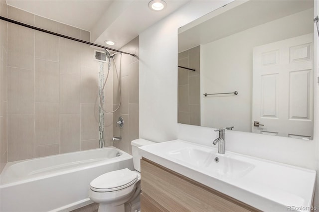 full bathroom with toilet, recessed lighting, vanity, and shower / bathing tub combination